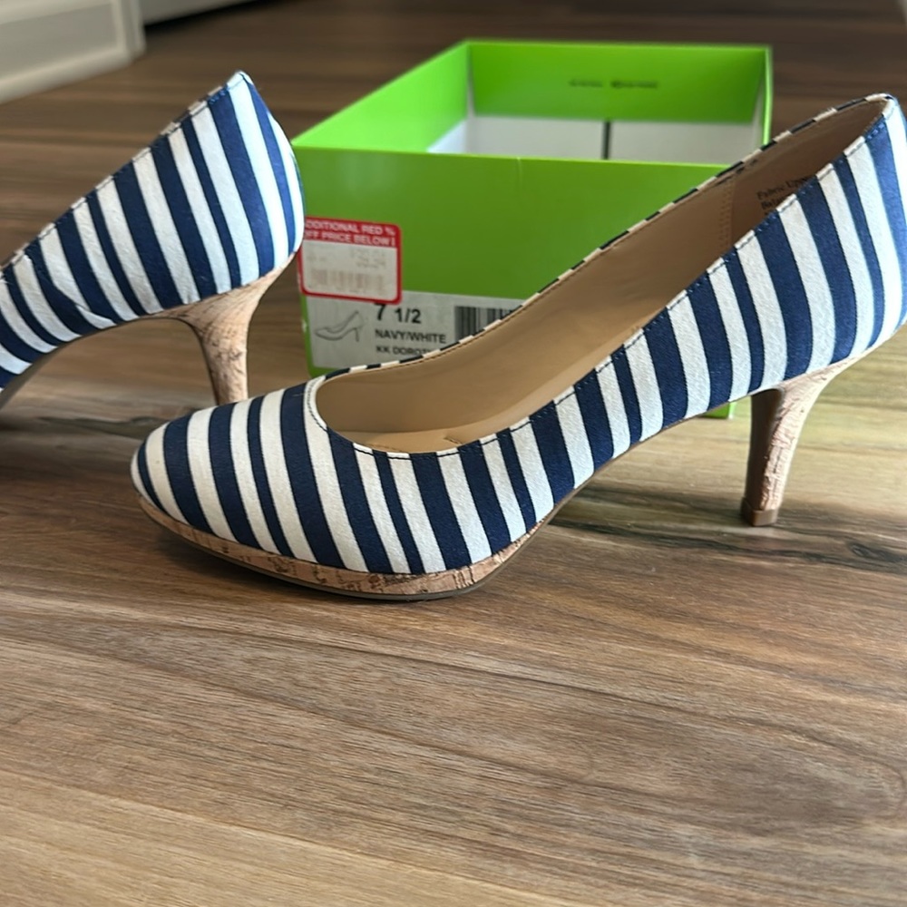 Brand new navy and white strip with cork like heels. 7.5 never worn.